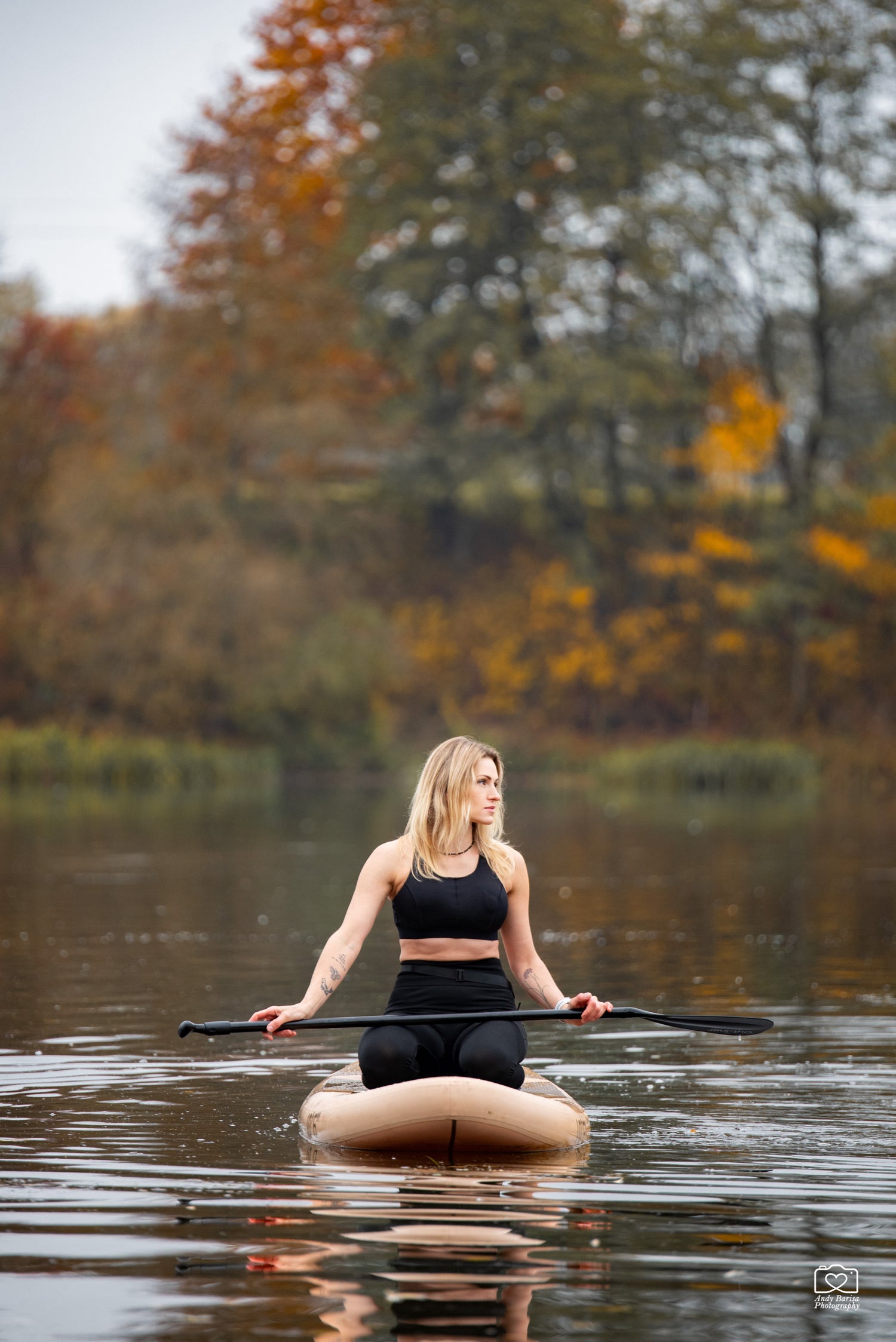 Tmg sport owner on a paddleboard